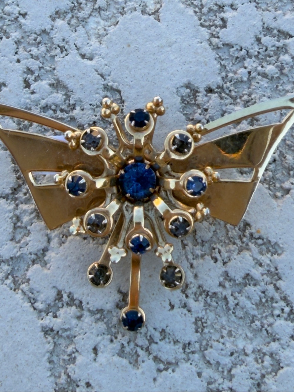 Gold-tone Brooch with Deep Blue and Smoky Crystals